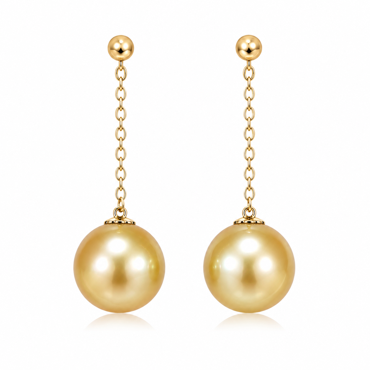 Long golden pearl drop earrings